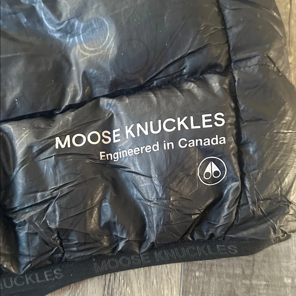 Moose Knuckles black hooded puffer with hologram imprint logo size small